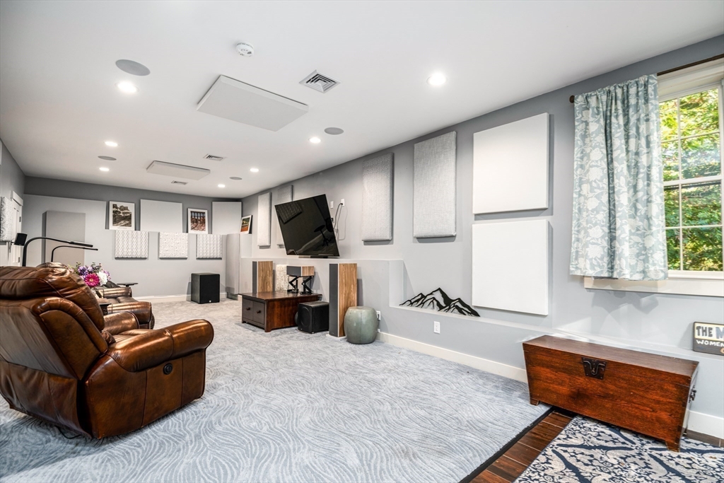 62 Old River Place Dedham, MA 02026 - Photo 31 of 39 a living room with furniture and a flat screen tv