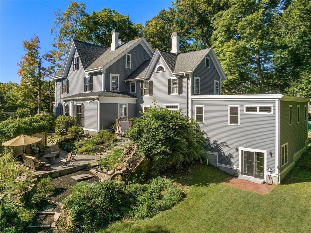 62 Old River Place Dedham, MA 02026 - Photo 35 of 39 front view of a house with a yard