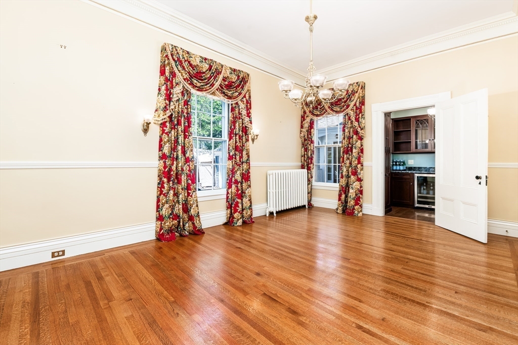 62 Old River Place Dedham, MA 02026 - Photo 10 of 39 a view of a room with wooden floor and entryway