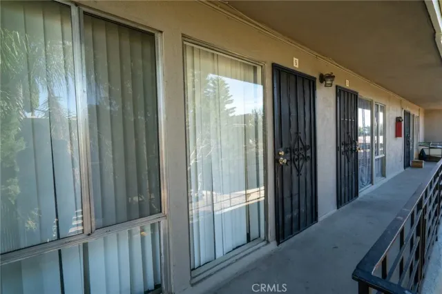 a view of entryway with a wooden door