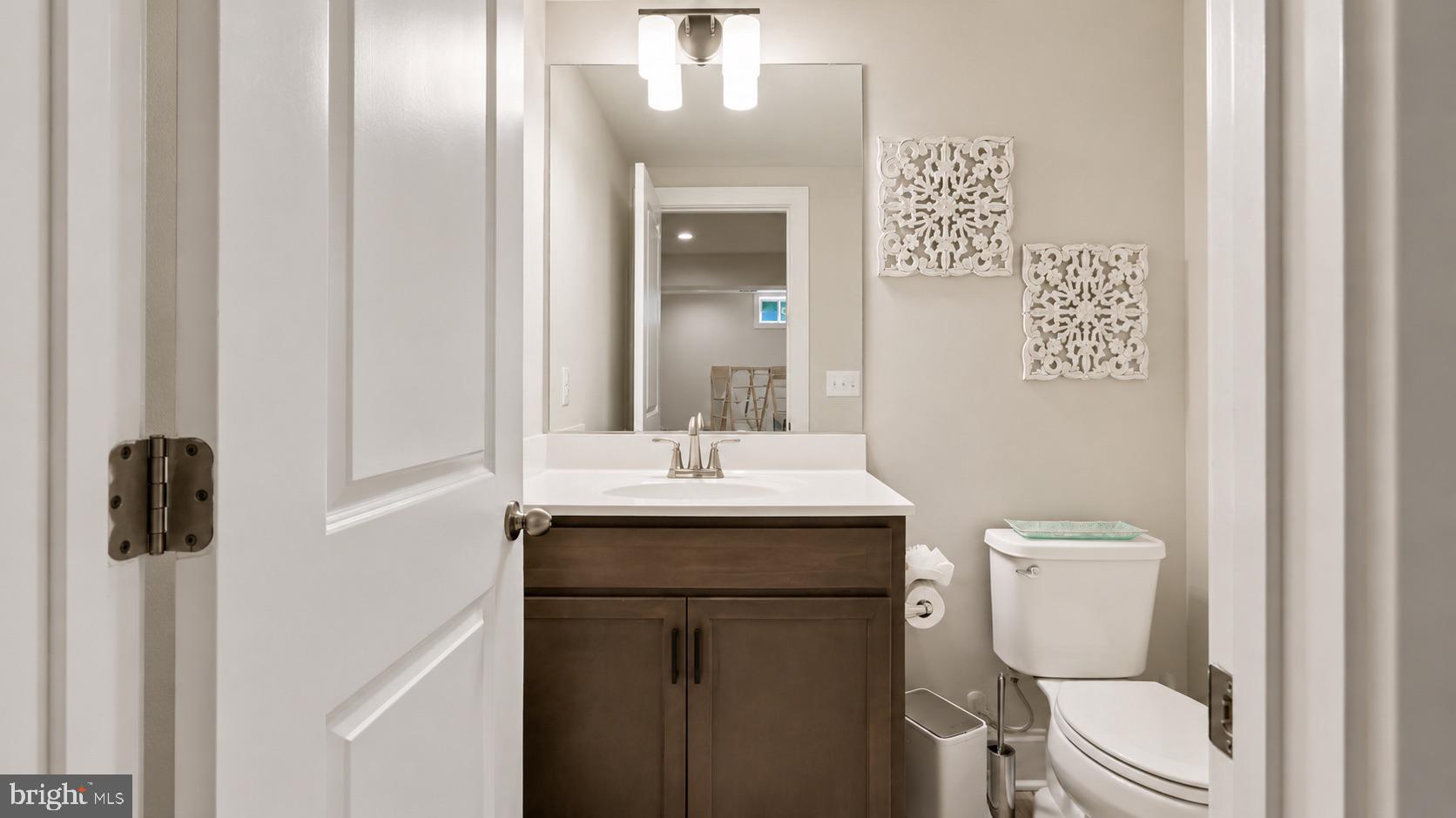 23609 Roselle Ridge Lane Aldie, VA 20105 - Photo 60 of 75 Modern elegance in a cozy bathroom.