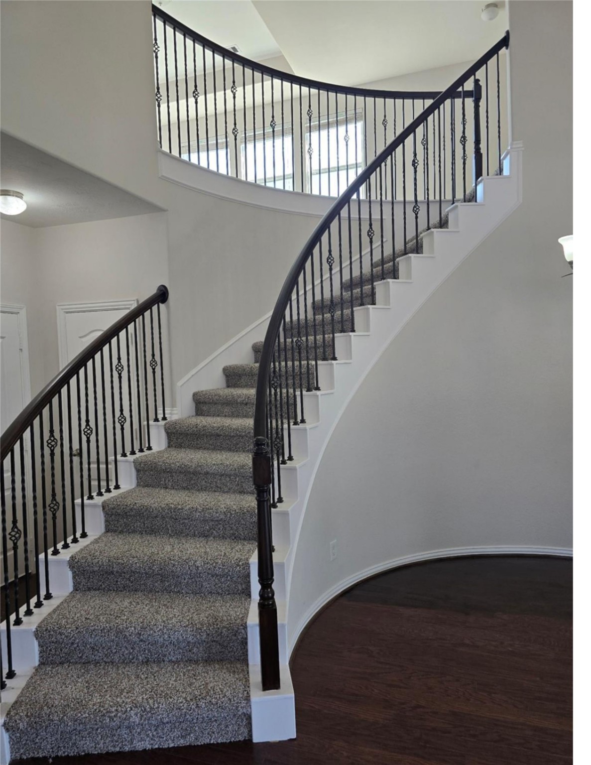 9702 Layton Ridge Drive Humble, TX 77396 - Photo 18 of 21 a view of staircase with wooden floor and stairs