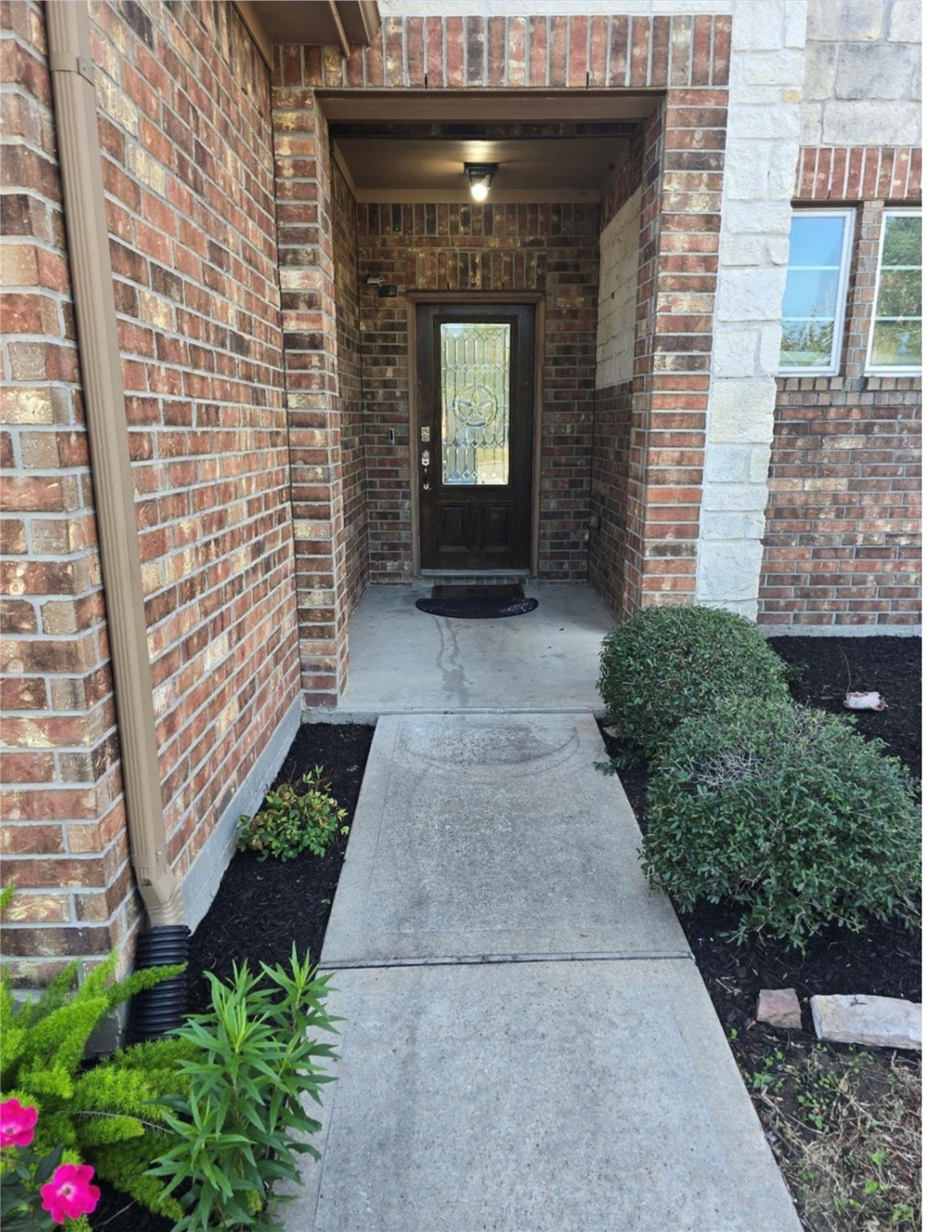 9702 Layton Ridge Drive Humble, TX 77396 - Photo 20 of 21 a front view of a house with a yard