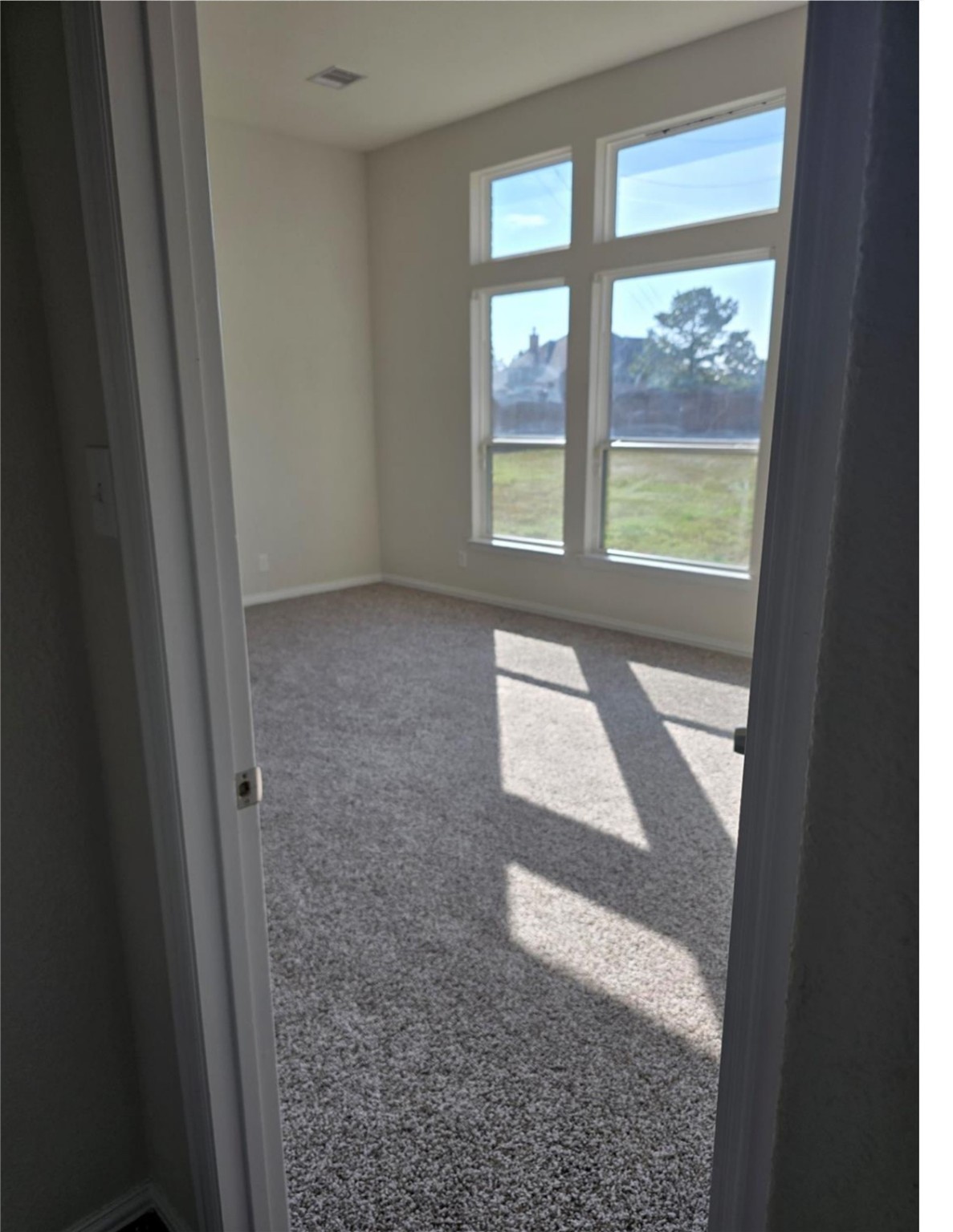 9702 Layton Ridge Drive Humble, TX 77396 - Photo 4 of 21 a view of hallway with windows