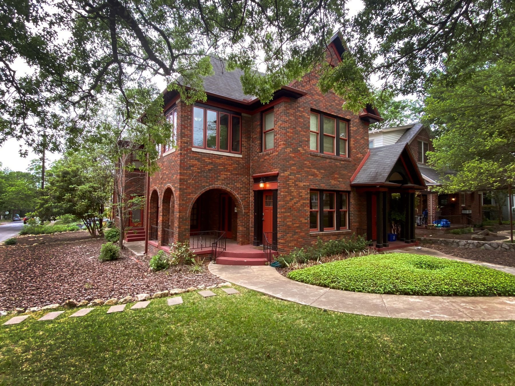 A stunning 1932 built duplex on a tree-lined historic street in Central Austin.