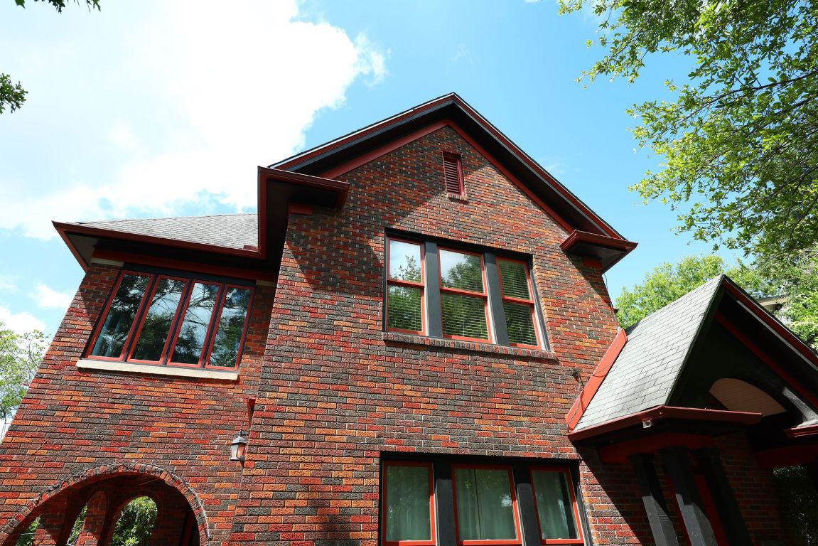609 Texas Austin, TX 78705 - Photo 14 of 18 View of property exterior featuring brick siding.