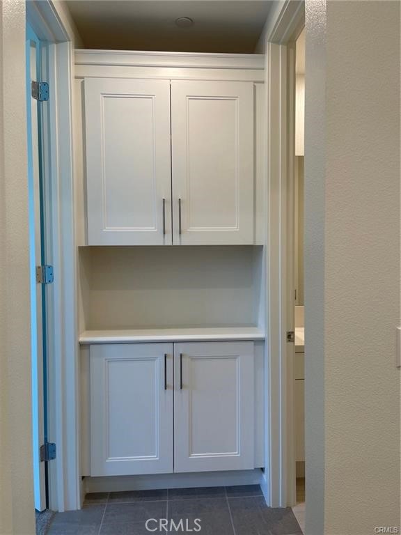 3326 Doheny Way Dana Point, CA 92629 - Photo 26 of 46 a close view of wooden cabinets