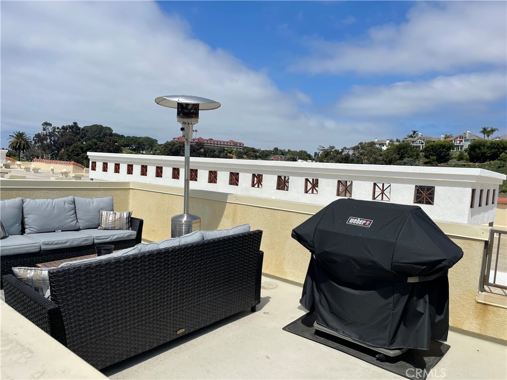 3326 Doheny Way Dana Point, CA 92629 - Photo 5 of 46 a view of a chairs and table in the balcony