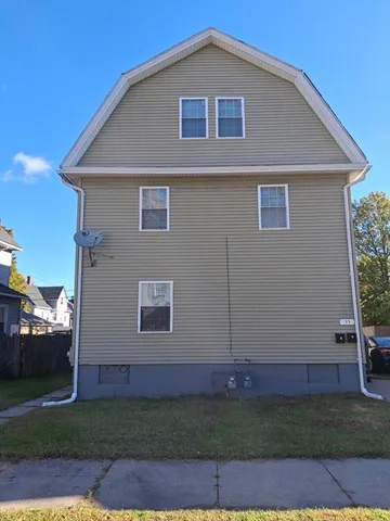 a front view of house with yard