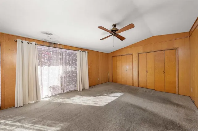 a view of empty room with windows