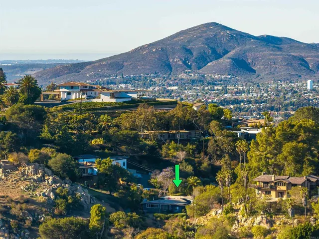 a view of a city with a lake