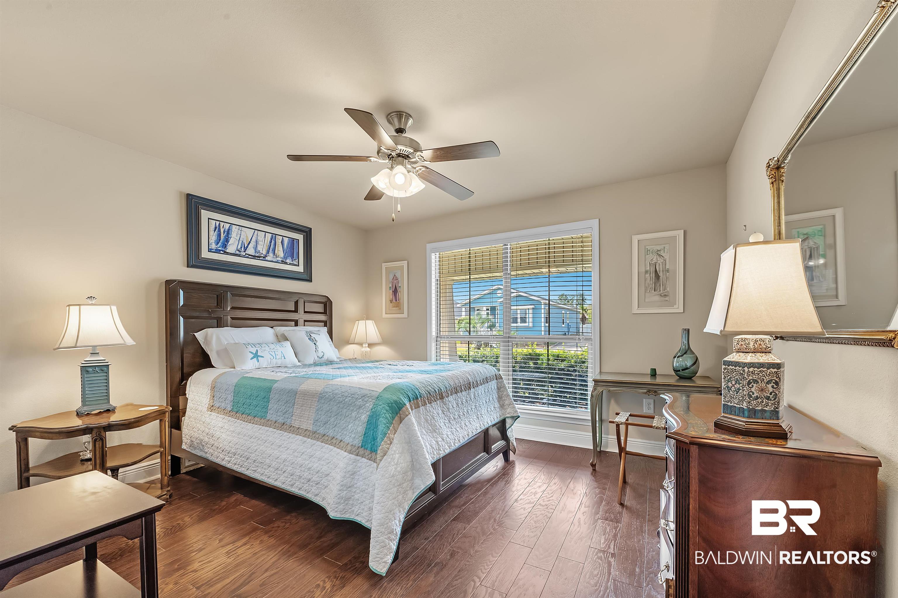 8896 Allay Lane Foley, AL 36535 - Photo 49 of 57 Bedroom featuring dark wood-type flooring and ceiling fan