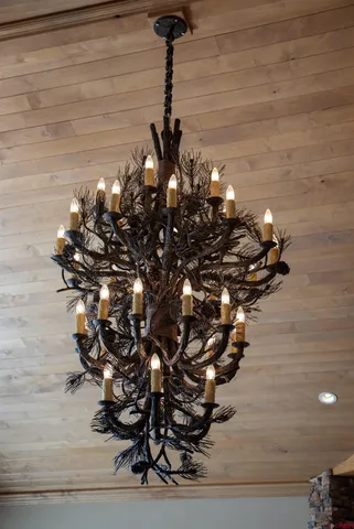 a vase of flowers sitting on a floor