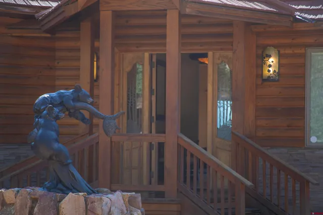 a view of a balcony with furniture