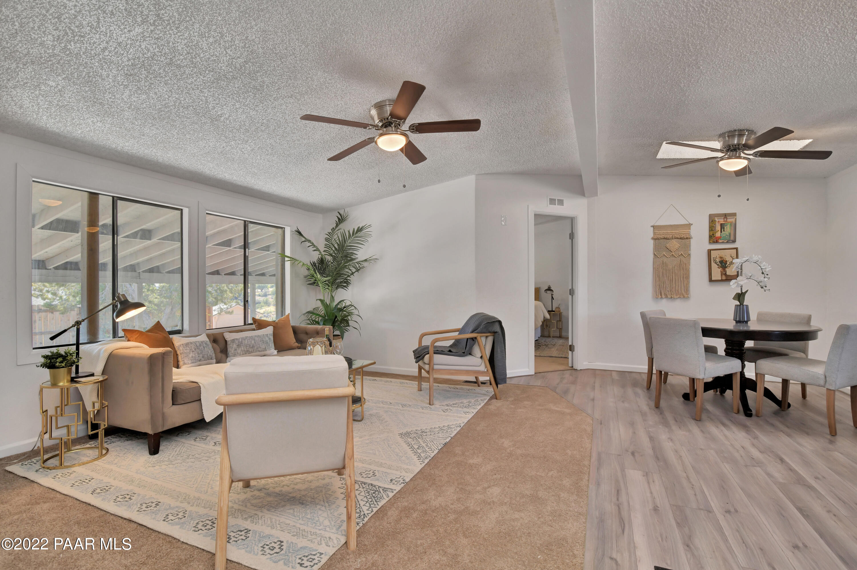 4515 Quail Hollow Road Rimrock, AZ 86335 - Photo 5 of 33 a living room with furniture two window and a table