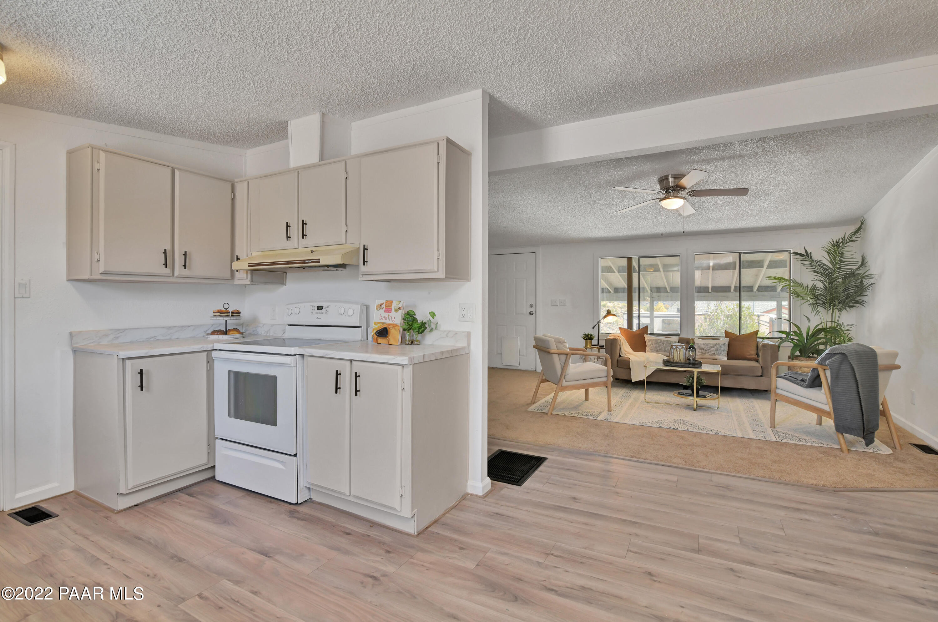 4515 Quail Hollow Road Rimrock, AZ 86335 - Photo 9 of 33 a view of kitchen with cabinets and wooden floor