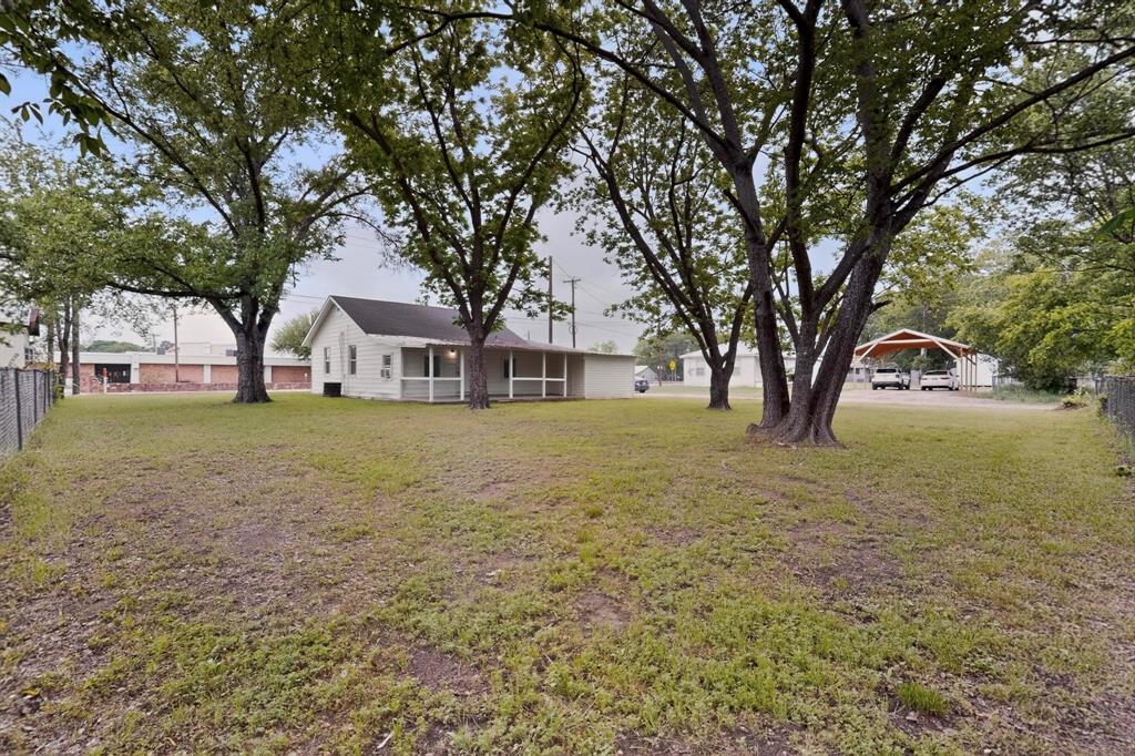 313 Farm To Market 316 Eustace, TX 75124 - Photo 33 of 33 a house view with swimming pool in front of it