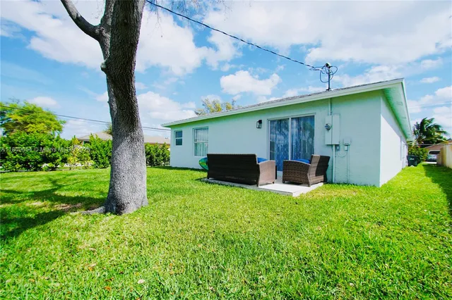 a house view with a garden space