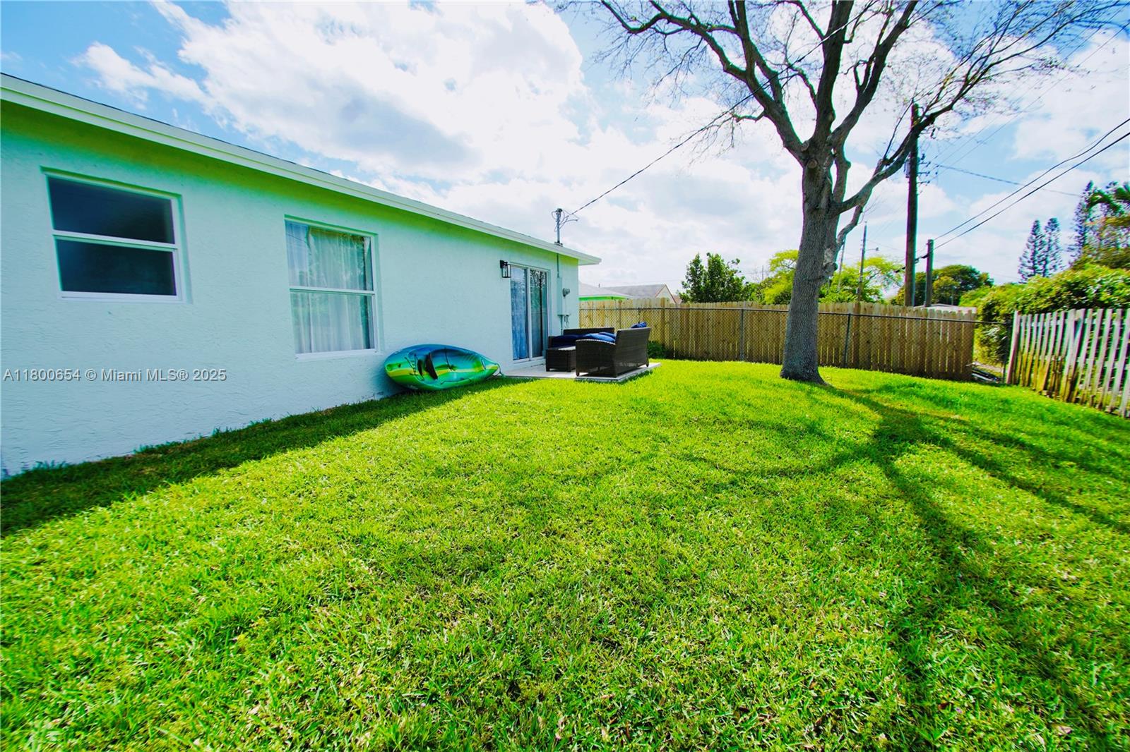 244 Northwest 6th Avenue, Unit 244 Delray Beach, FL 33444 - Photo 32 of 35 a view of a backyard of the house