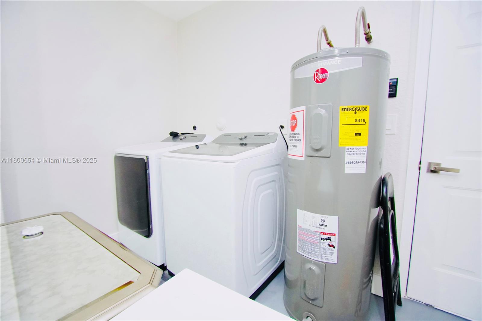 244 Northwest 6th Avenue, Unit 244 Delray Beach, FL 33444 - Photo 33 of 35 a bathroom with a sink and toilet