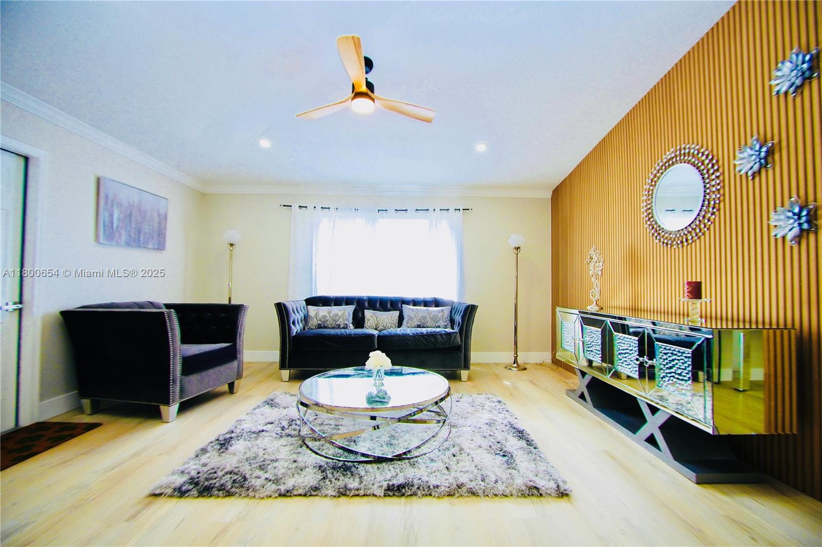 244 Northwest 6th Avenue, Unit 244 Delray Beach, FL 33444 - Photo 8 of 35 a living room with furniture and a fireplace