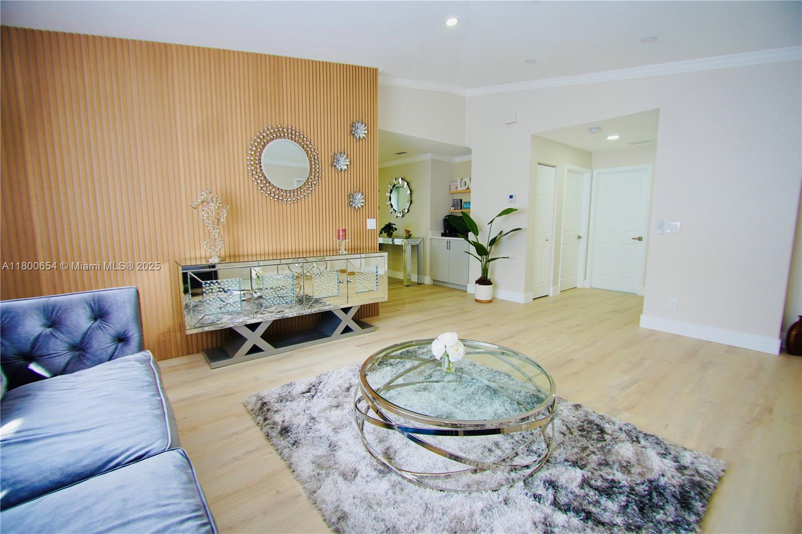 244 Northwest 6th Avenue, Unit 244 Delray Beach, FL 33444 - Photo 9 of 35 a living room with furniture and a couch