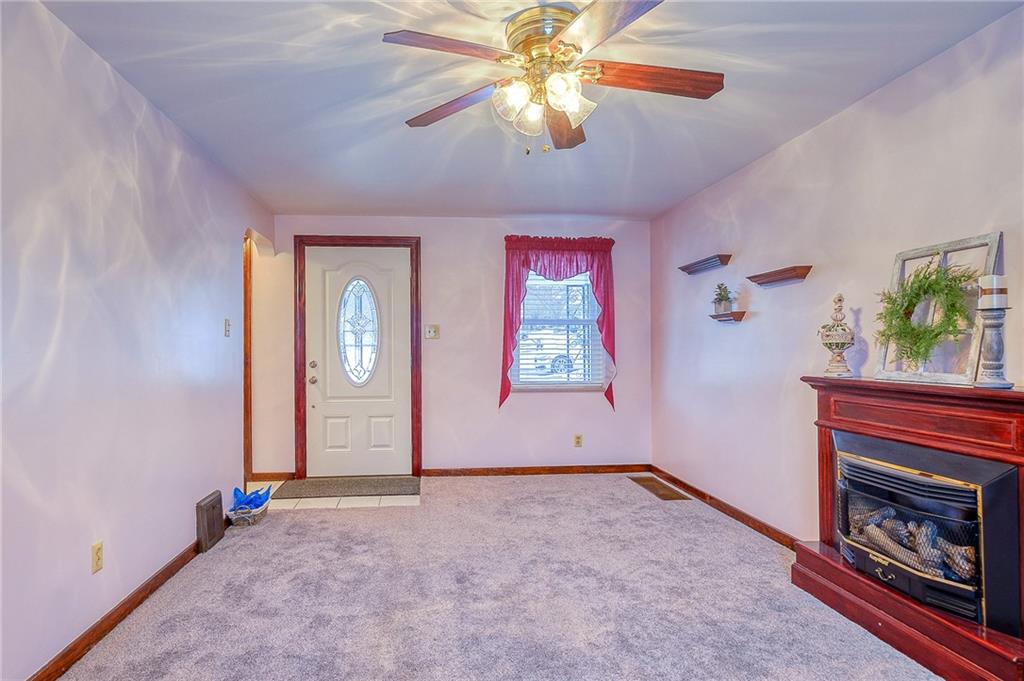 33 Kennedy Lane McKees Rocks, PA 15136 - Photo 6 of 19 an empty room with windows and fan