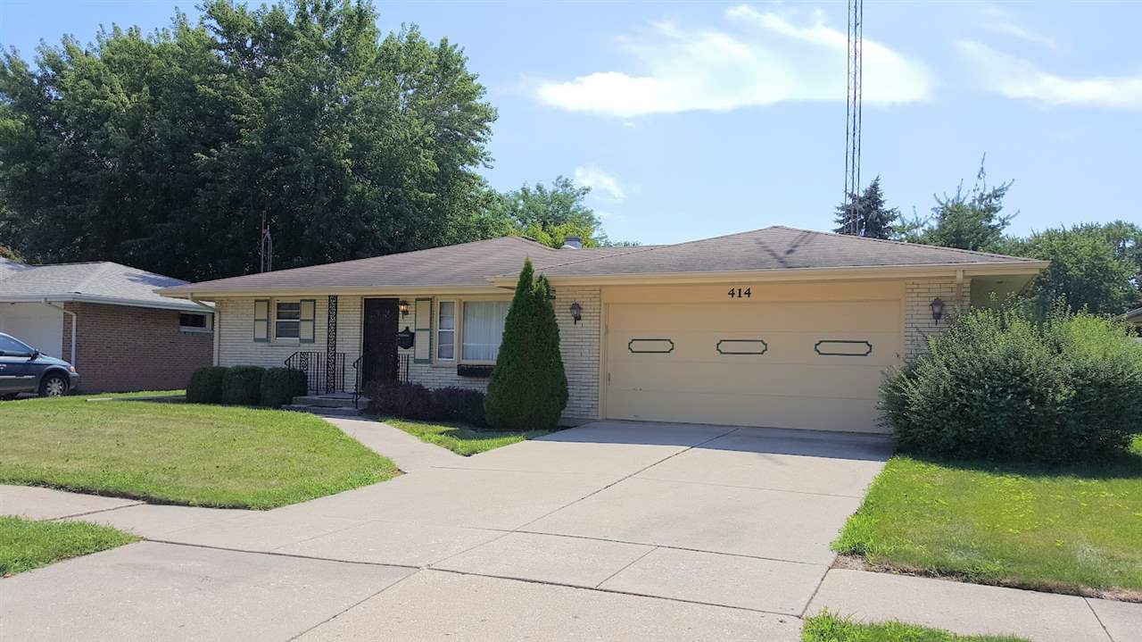 414 Rebecca Road Belvidere, IL 61008 - Photo 1 of 22 a front view of house with yard and green space