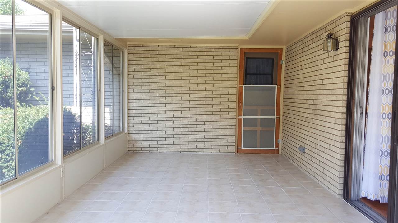 414 Rebecca Road Belvidere, IL 61008 - Photo 12 of 22 a view of an empty room with a window