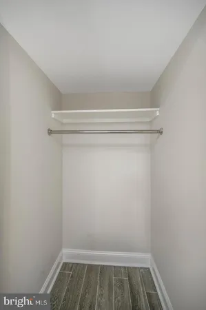 a view of small space with racks on the wall