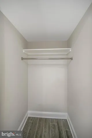 a view of small space with racks on the wall