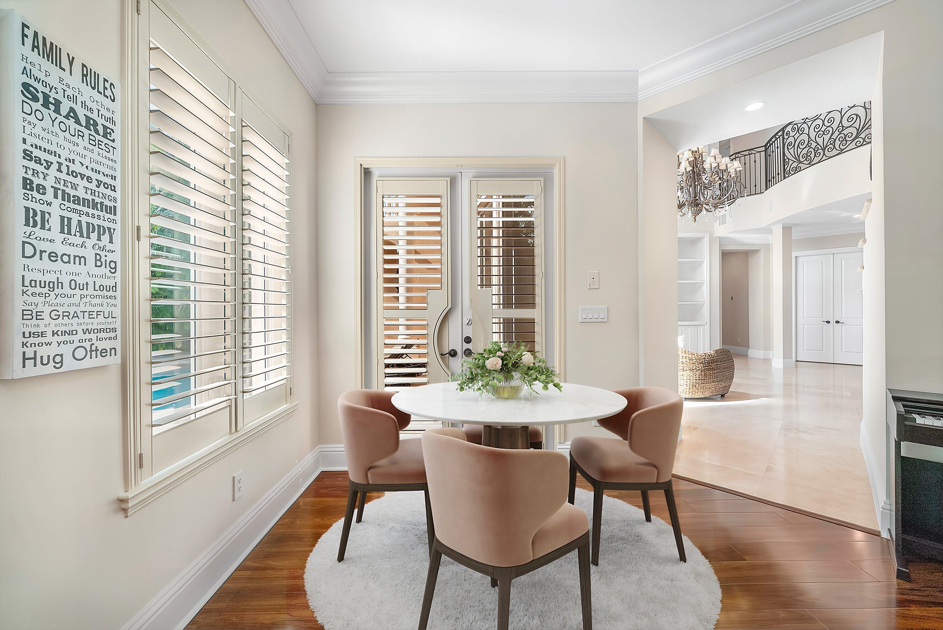 398 Northeast 7th Street Boca Raton, FL 33432 - Photo 30 of 74 a view of a dining room with furniture and wooden floor