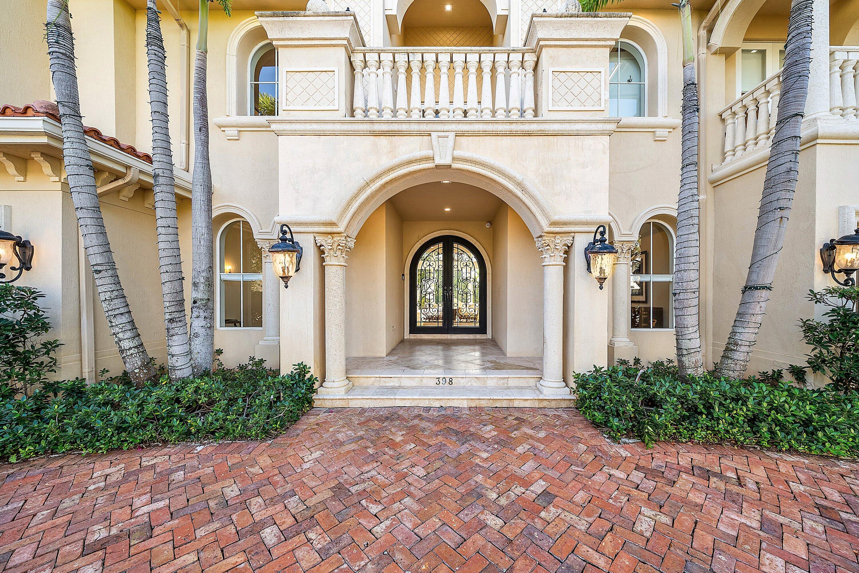 398 Northeast 7th Street Boca Raton, FL 33432 - Photo 4 of 74 a front view of a house with garden