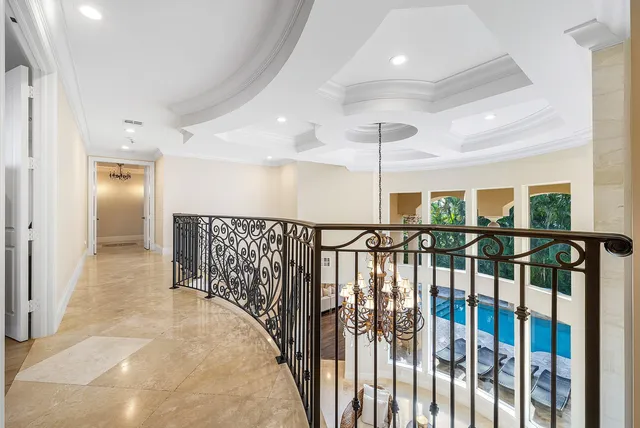 a view of swimming pool with a lounge chair