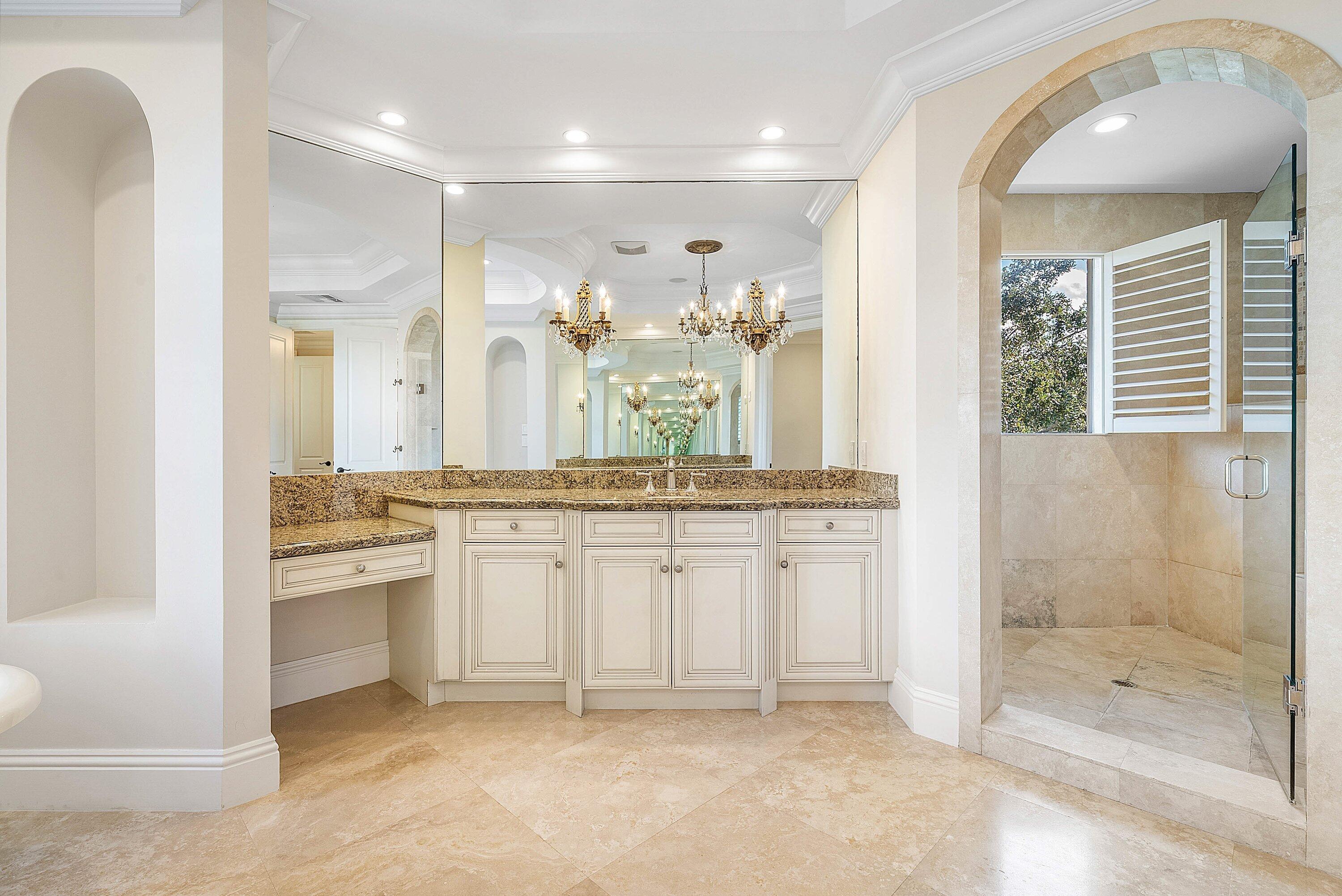398 Northeast 7th Street Boca Raton, FL 33432 - Photo 57 of 74 a bathroom with a double vanity sink and a mirror