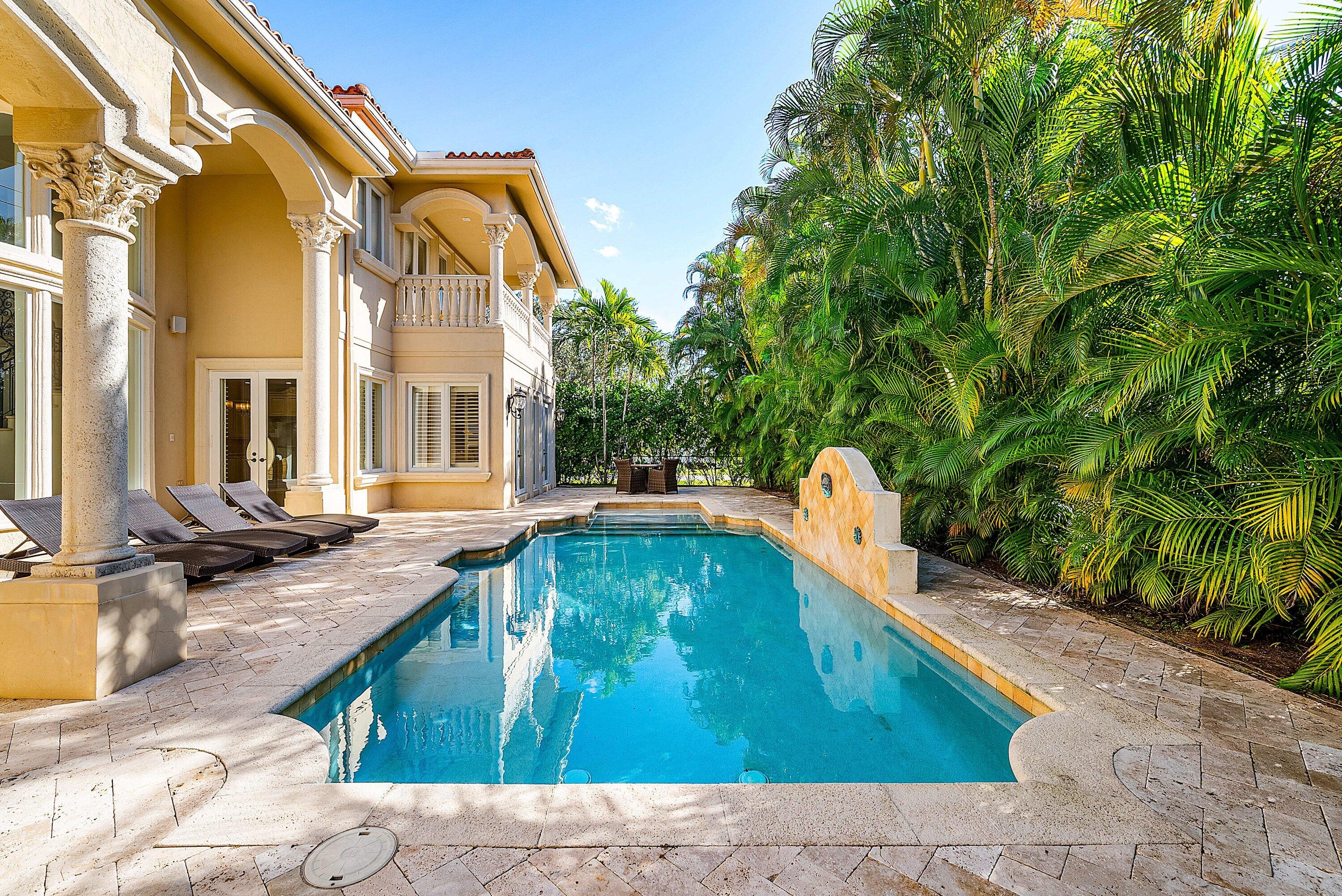 398 Northeast 7th Street Boca Raton, FL 33432 - Photo 63 of 74 a swimming pool with outdoor seating and yard