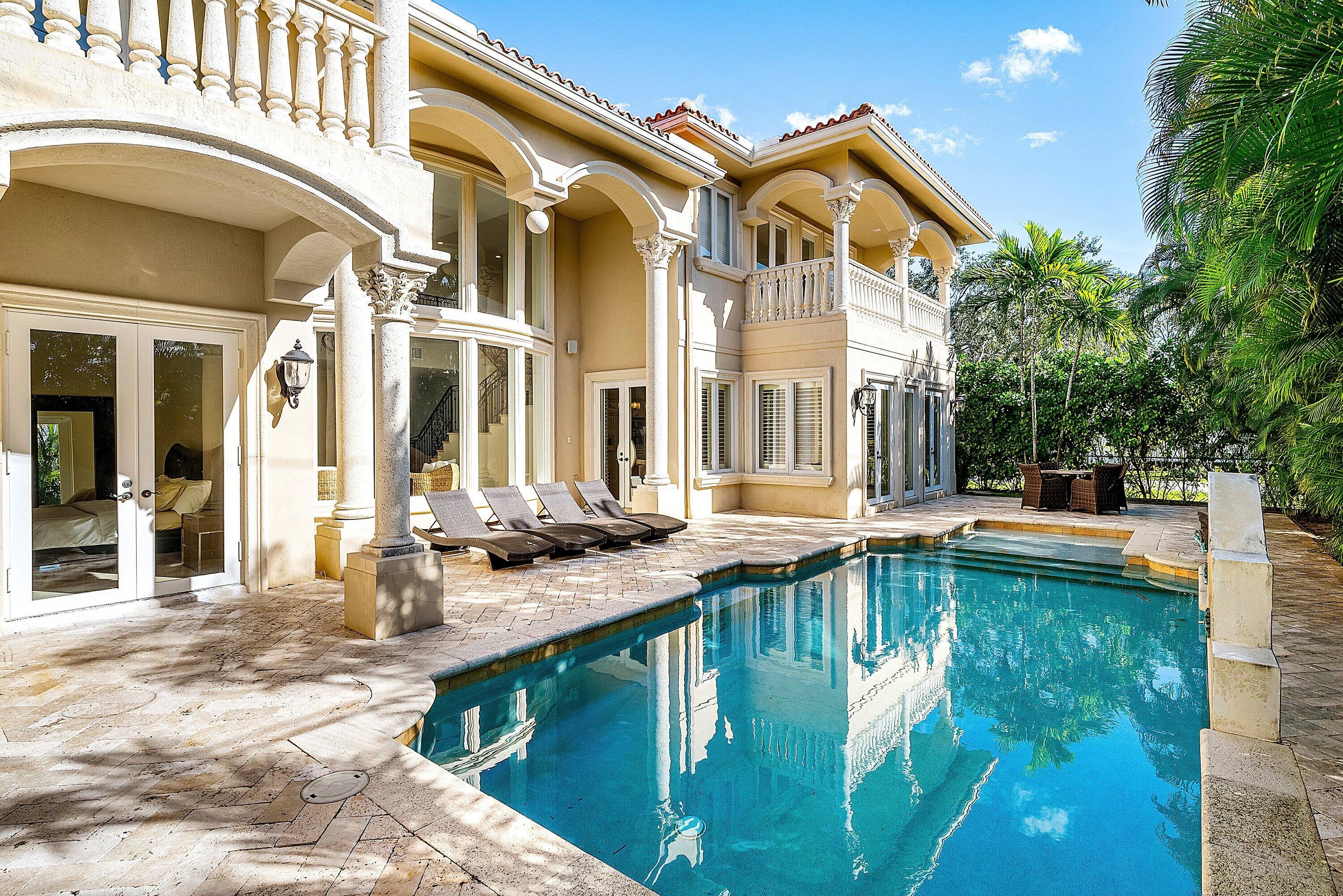 398 Northeast 7th Street Boca Raton, FL 33432 - Photo 66 of 74 a view of a house with pool and sitting area