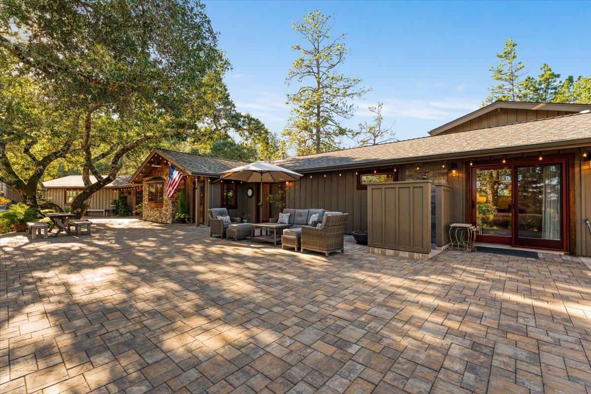 7409 Hihn Road Ben Lomond, CA 95005 - Photo 14 of 101 a view of a house with backyard porch and sitting area