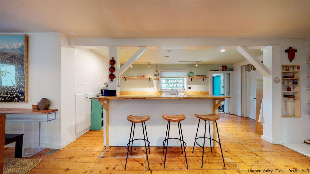209-211 Fish Creek Road Saugerties, NY 12477 - Photo 11 of 35 a dining room with a table and chairs