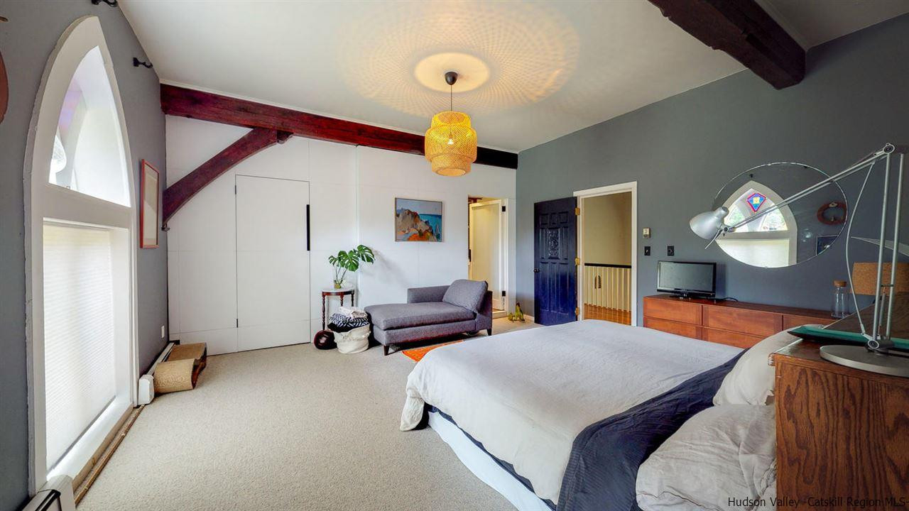 209-211 Fish Creek Road Saugerties, NY 12477 - Photo 19 of 35 a bedroom with a bed and wooden floor