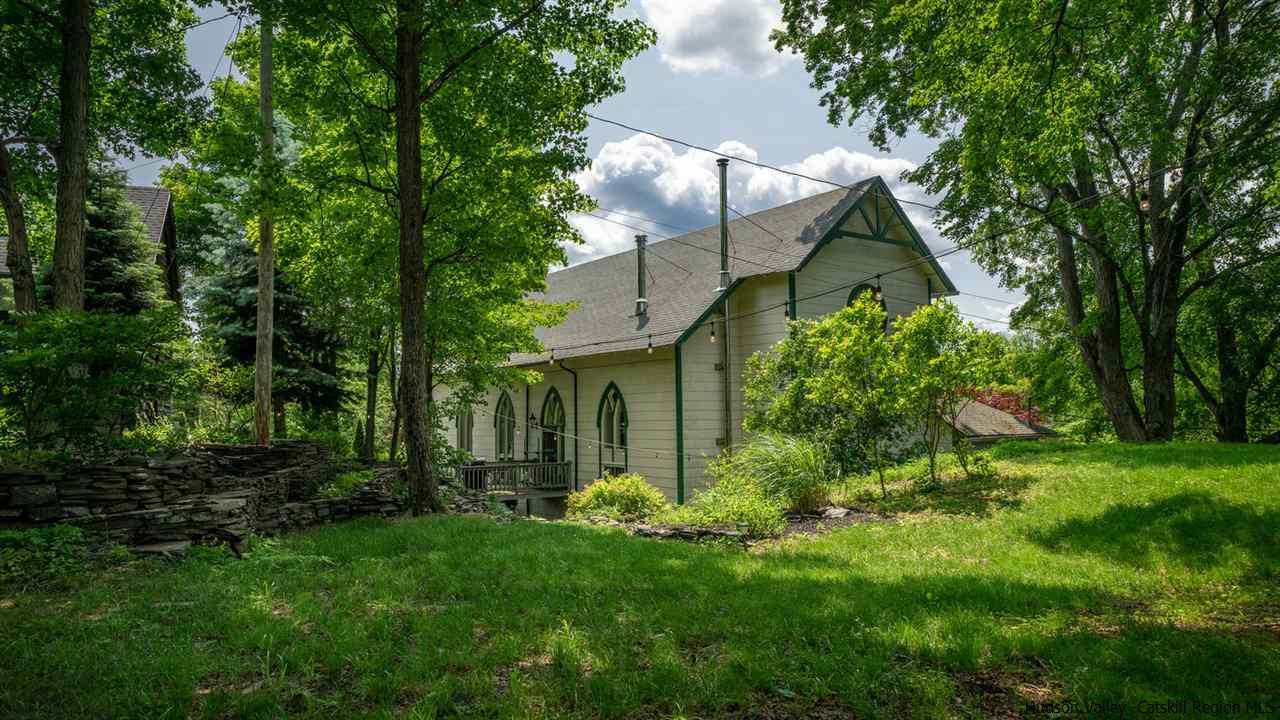 209-211 Fish Creek Road Saugerties, NY 12477 - Photo 2 of 35 a front view of a house with garden