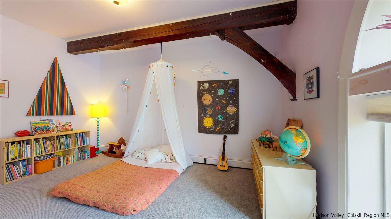 209-211 Fish Creek Road Saugerties, NY 12477 - Photo 22 of 35 a bedroom with a bed and a window