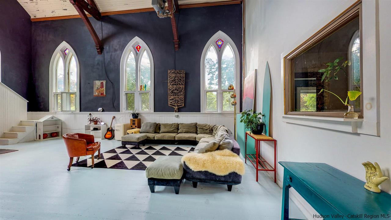 209-211 Fish Creek Road Saugerties, NY 12477 - Photo 6 of 35 a living room with furniture and a large mirror