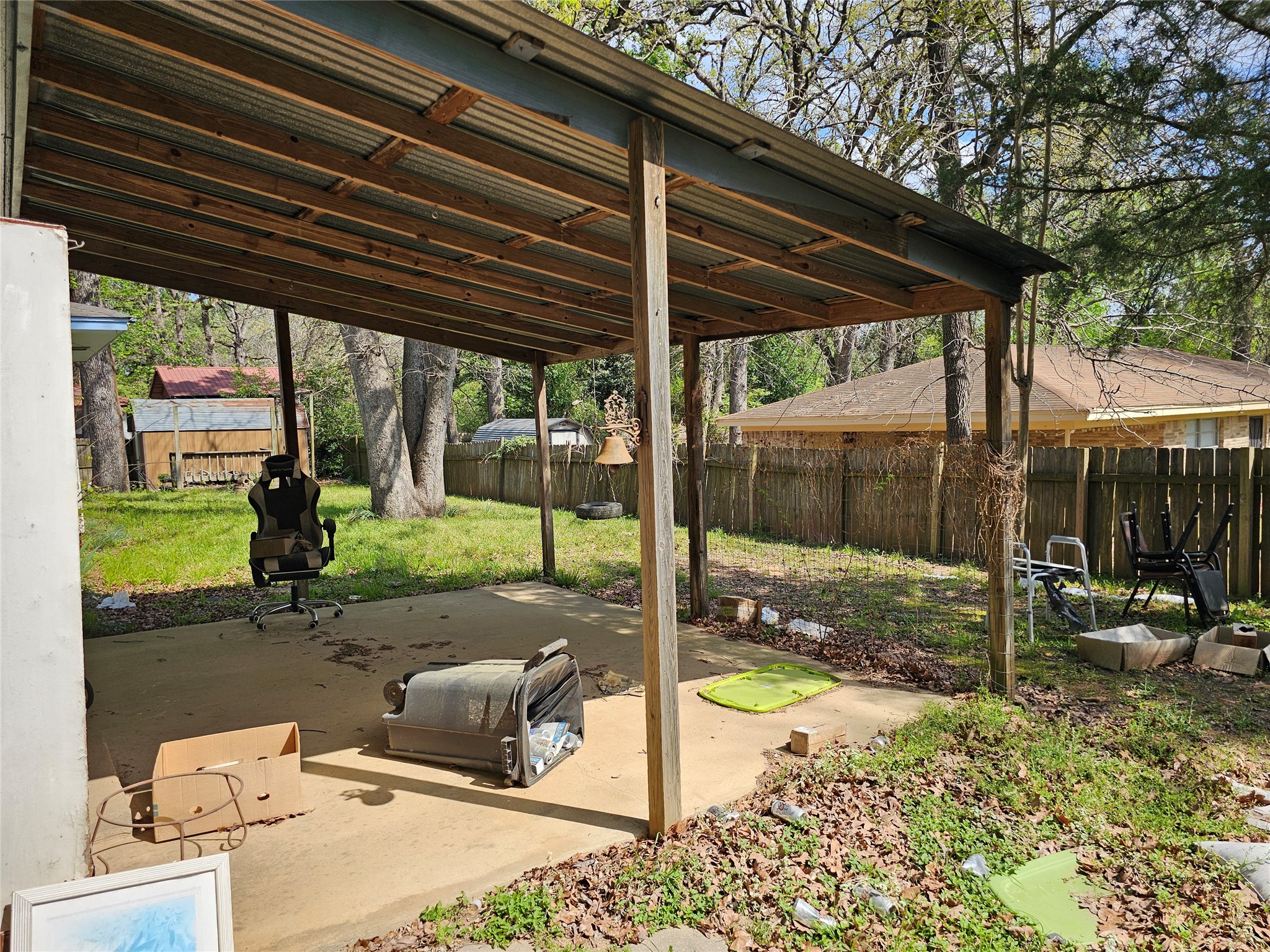 216 Westwood Road Palestine, TX 75803 - Photo 21 of 23 a backyard of a house with a garden
