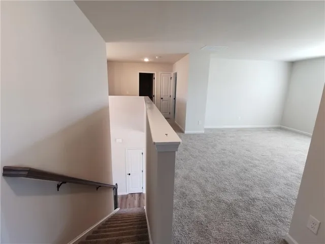 a view of hallway with stairs