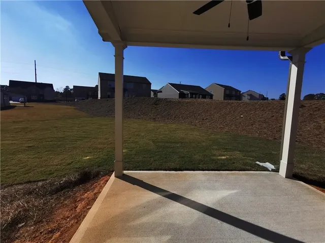 a view of a balcony with an ocean view