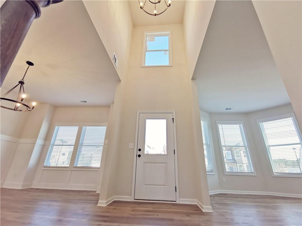 38 Longhorn Way Auburn, GA 30011 - Photo 5 of 36 a view of an entryway with wooden floor