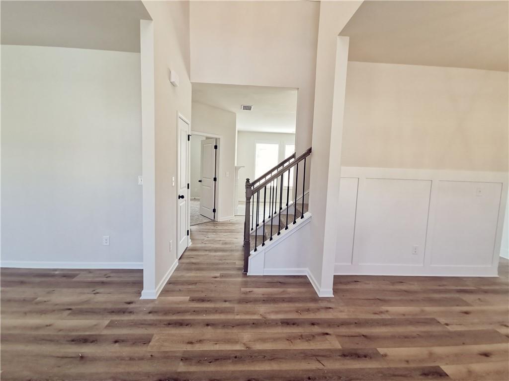 38 Longhorn Way Auburn, GA 30011 - Photo 6 of 36 a view of a hallway with wooden floor and entryway