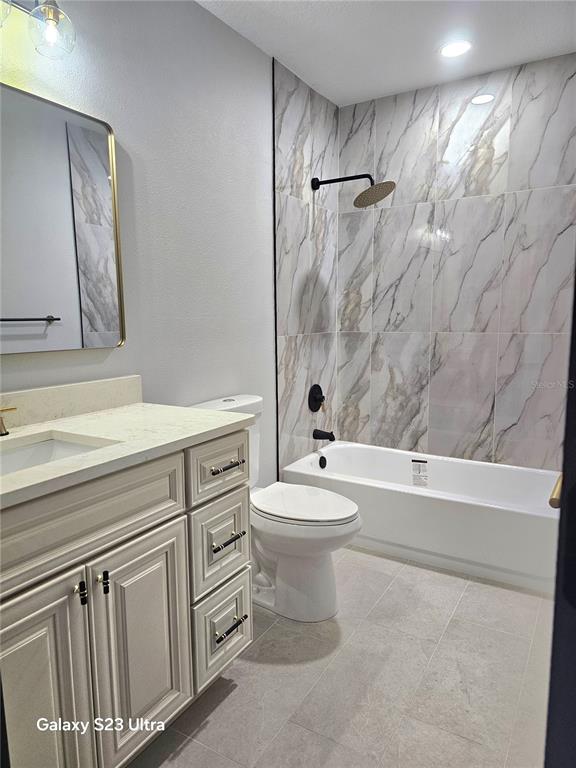 2435 Sumatran Way, Unit 35 Clearwater, FL 33763 - Photo 16 of 69 a bathroom with a sink a toilet and shower