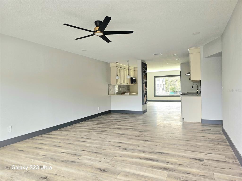 2435 Sumatran Way, Unit 35 Clearwater, FL 33763 - Photo 2 of 69 a view of a kitchen and an empty room